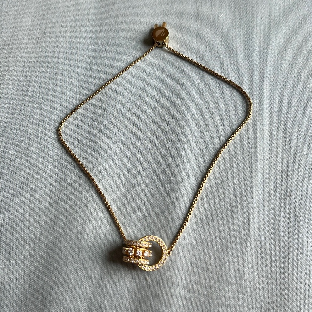 Swarovski adjustable gold bracelet with interlocking hoops